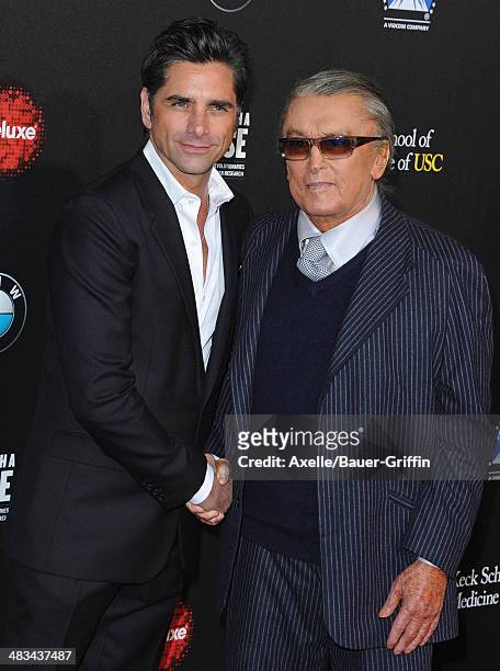 Actor John Stamos and producer Robert Evans arrive at the 2nd Annual Rebels With A Cause Gala at Paramount Studios on March 20, 2014 in Hollywood,...