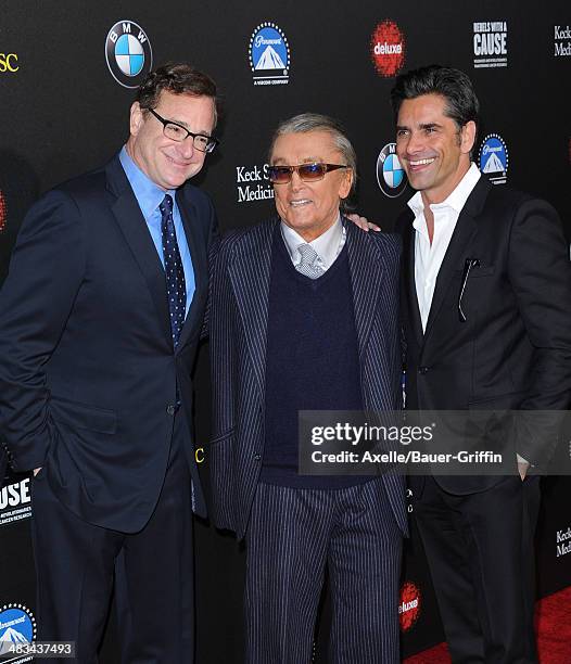 Actor Bob Saget, producer Robert Evans and actor John Stamos arrive at the 2nd Annual Rebels With A Cause Gala at Paramount Studios on March 20, 2014...