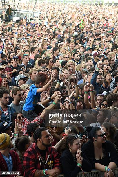 Fans watch Billy Idol perform at the Lands End Stage during day 2 of the 2015 Outside Lands Music And Arts Festival at Golden Gate Park on August 8,...