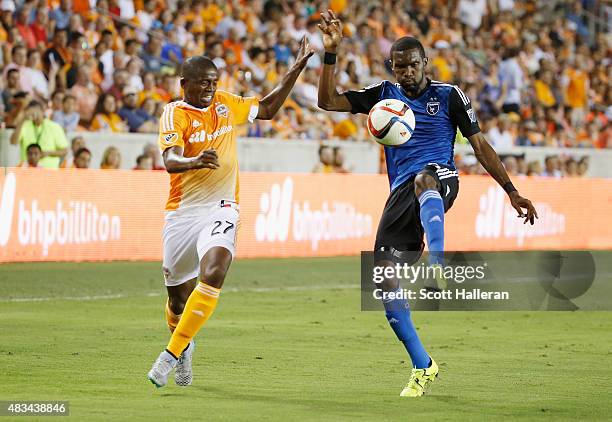 Shaun Francis of the San Jose Earthquakes battles for the ball with Boniek Garcia of the Houston Dynamo during their game at BBVA Compass Stadium on...