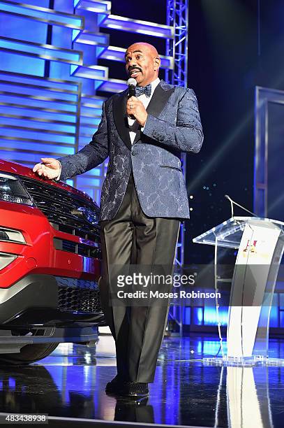 Steve Harvey speaks at the 2015 Ford Neighborhood Awards Hosted By Steve Harvey at Phillips Arena on August 8, 2015 in Atlanta, Georgia.