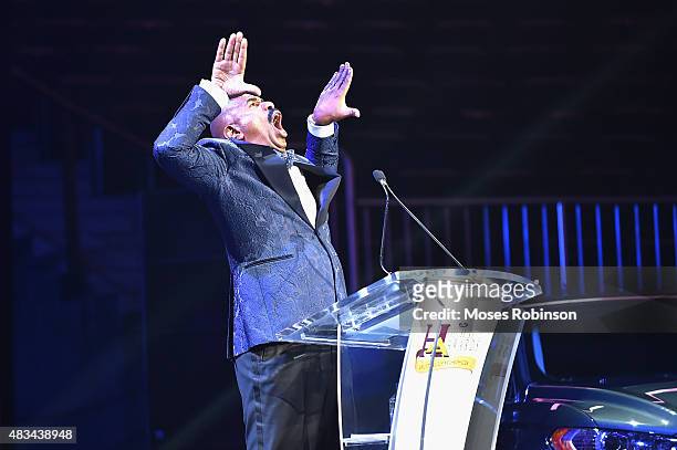 Steve Harvey speaks at the 2015 Ford Neighborhood Awards Hosted By Steve Harvey at Phillips Arena on August 8, 2015 in Atlanta, Georgia.