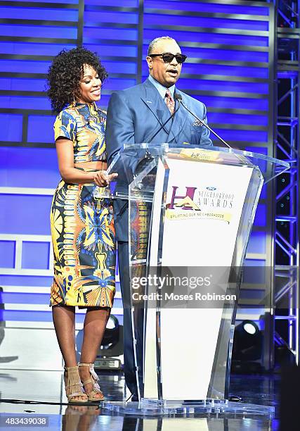 Wendy Raquel Robinson and Ed Gordon speak at the 2015 Ford Neighborhood Awards Hosted By Steve Harvey at Phillips Arena on August 8, 2015 in Atlanta,...