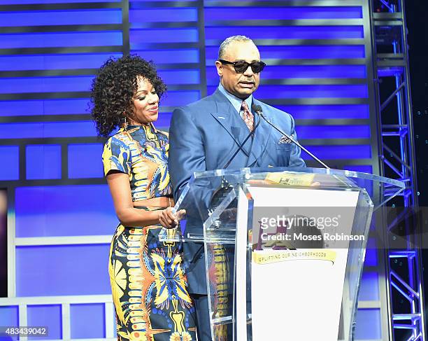 Wendy Raquel Robinson and Ed Gordon speak at the 2015 Ford Neighborhood Awards Hosted By Steve Harvey at Phillips Arena on August 8, 2015 in Atlanta,...