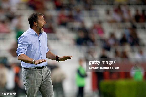 Gustavo Matosas coach of Atlas gives instructions to his players during a 3rd round match between Atlas and Monterrey as part of the Apertura 2015...