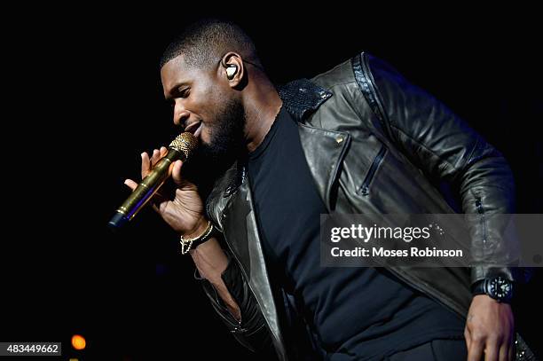 Usher performs at the 2015 Ford Neighborhood Awards Hosted By Steve Harvey at Phillips Arena on August 8, 2015 in Atlanta, Georgia.