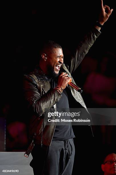 Usher performs at the 2015 Ford Neighborhood Awards Hosted By Steve Harvey at Phillips Arena on August 8, 2015 in Atlanta, Georgia.