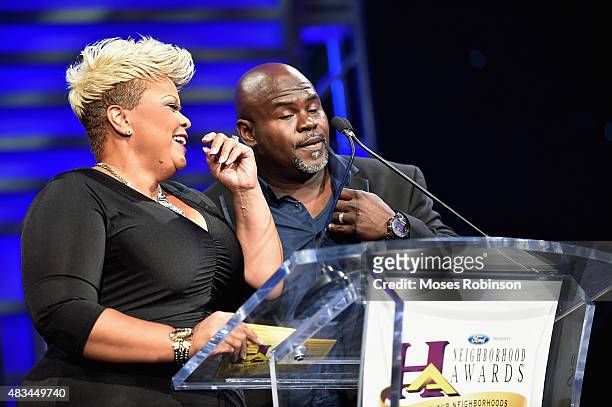 Tamela J. Mann and David Mann speak onstage at the 2015 Ford Neighborhood Awards Hosted By Steve Harvey at Phillips Arena on August 8, 2015 in...