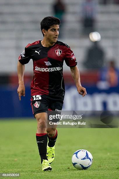 Jorge Zarate of Atlas drives the ball during a 3rd round match between Atlas and Monterrey as part of the Apertura 2015 Liga MX at Jalisco Stadium on...