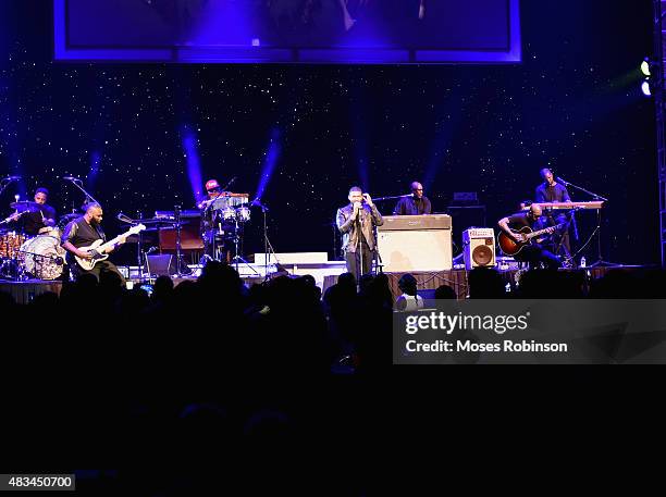 Usher performs at the 2015 Ford Neighborhood Awards Hosted By Steve Harvey at Phillips Arena on August 8, 2015 in Atlanta, Georgia.