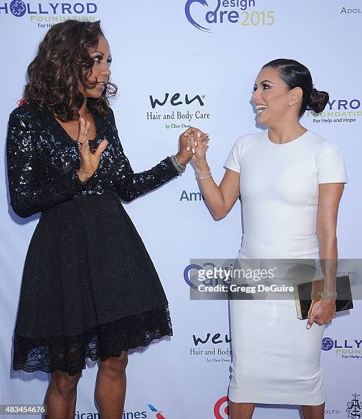 Actors Holly Robinson Peete and Eva Longoria arrive at HollyRod Foundation's 17th Annual DesignCare Gala at The Lot Studios on August 8, 2015 in Los...