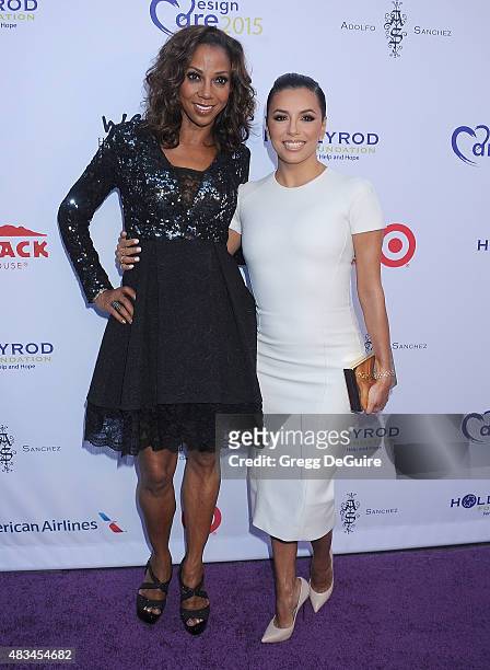 Actors Holly Robinson Peete and Eva Longoria arrive at HollyRod Foundation's 17th Annual DesignCare Gala at The Lot Studios on August 8, 2015 in Los...