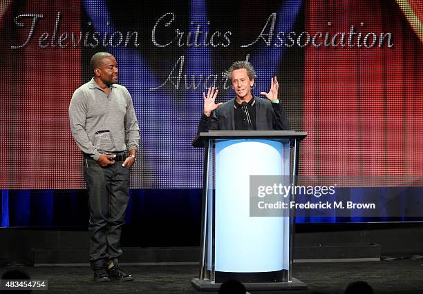 Director/producer Lee Daniels and producer Brian Grazer accept the TCA Award for Program of the Year for 'Empire' onstage during the 31st annual...