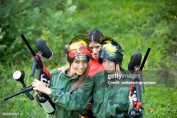 paintball team - toy gun stock pictures, royalty-free photos & images