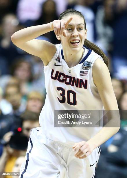 Breanna Stewart of the Connecticut Huskies reacts after a basket against the Notre Dame Fighting Irish during the NCAA Women's Final Four...