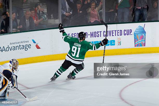 Tyler Seguin of the Dallas Stars celebrates the game winning shoot-out goal against Pekka Rinne of the Nashville Predators at the American Airlines...
