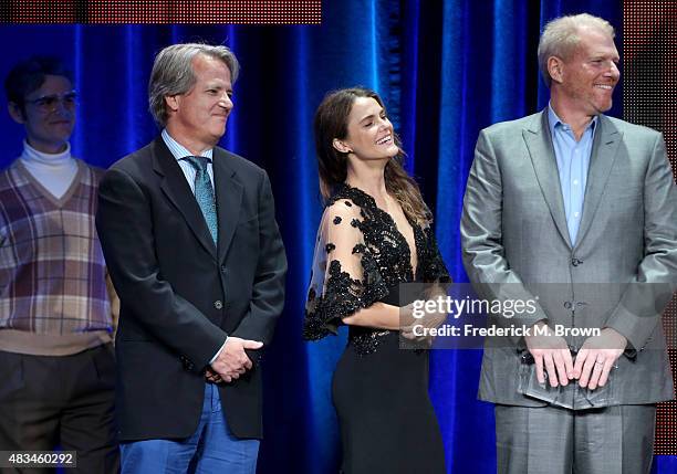 Executive producer Graham Yost and actors Keri Russell and Noah Emmerich accept the TCA Award for Outstanding Achievement in Drama for 'The...