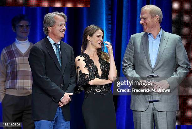 Executive producer Graham Yost and actors Keri Russell and Noah Emmerich accept the TCA Award for Outstanding Achievement in Drama for 'The...