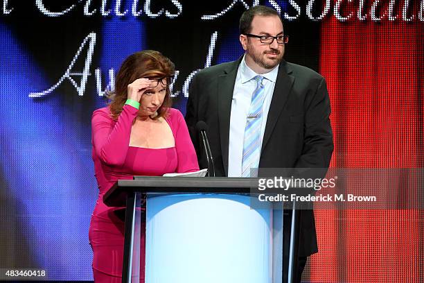 April Neale of Monsters and Critics and Alan Sepinwall of HitFix.com present the TCA Award for Outstanding New Program onstage during the 31st annual...