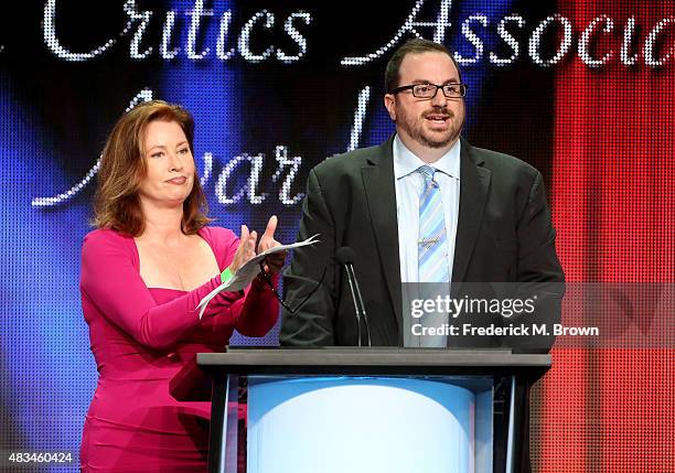 April Neale of Monsters and Critics and Alan Sepinwall of HitFix.com present the TCA Award for Outstanding New Program onstage during the 31st annual...