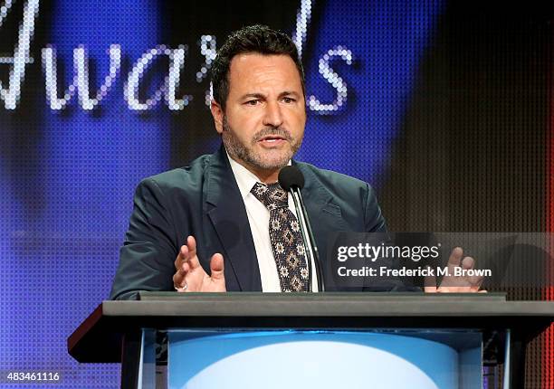 Executive producer Greg Gugliotta accepts the TCA Award for Outstanding Achievement in Youth Programming for 'The Fosters' onstage at the 31st annual...