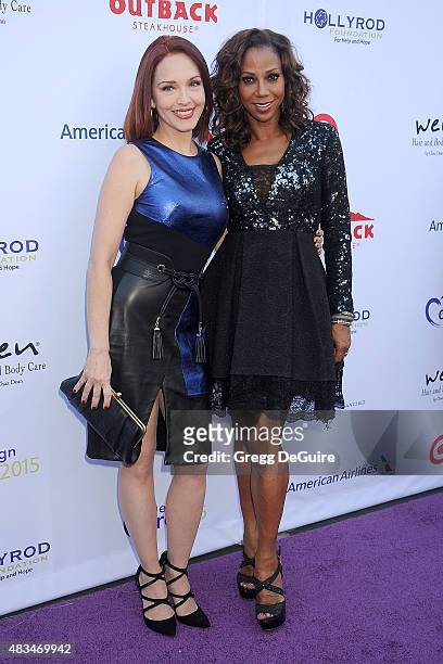 Actors Amy Yasbeck and Holly Robinson Peete arrive at HollyRod Foundation's 17th Annual DesignCare Gala at The Lot Studios on August 8, 2015 in Los...