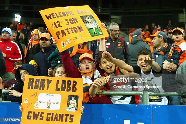 Giants fans show their support during the round 19 AFL match between the Greater Western Sydney Giants and the Essendon Bombers at Spotless Stadium...