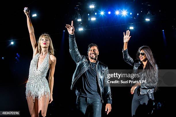 Taylor Swift, Russell Wilson and Ciara perform at CenturyLink Field on August 8, 2015 in Seattle, Washington.