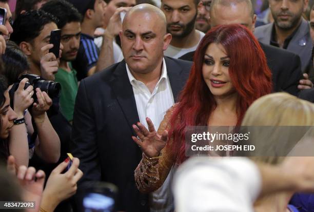 Lebanese pop star Haifa Wehbe arrives for the Premiere of he movie 'Halawet Rooh' at a movie theatre in the town of Dbayeh, North of Beirut on April...