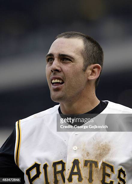 Jack Wilson of the Pittsburgh Pirates looks on from the dugout during a game against the Milwaukee Brewers at PNC Park on July 2, 2004 in Pittsburgh,...