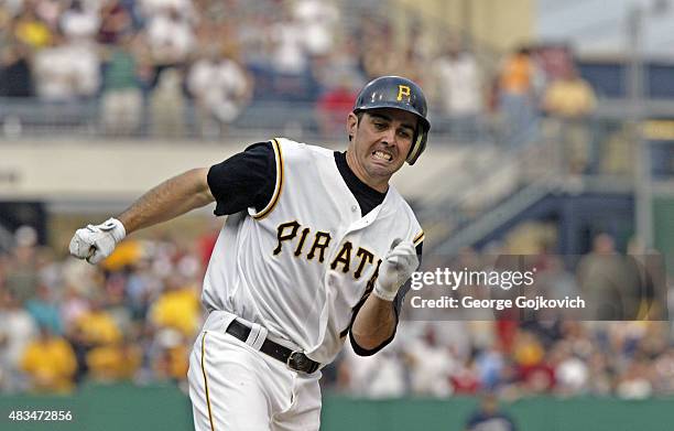 Jack Wilson of the Pittsburgh Pirates runs to third base during a game against the Milwaukee Brewers at PNC Park on July 2, 2004 in Pittsburgh,...