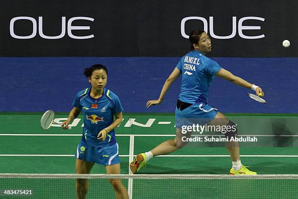 Ma Jin and Wang Xiaoli of China in action during the 2014 Singapore Open women's double round 1 match at Singapore Indoor Stadium on April 9, 2014 in...