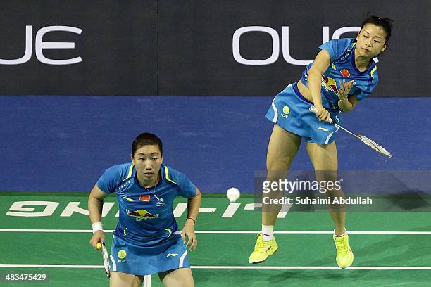 Ma Jin and Wang Xiaoli of China in action during the 2014 Singapore Open women's double round 1 match at Singapore Indoor Stadium on April 9, 2014 in...