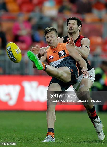 Rhys Palmer of the Giants kicks a goal during the round 19 AFL match between the Greater Western Sydney Giants and the Essendon Bombers at Spotless...