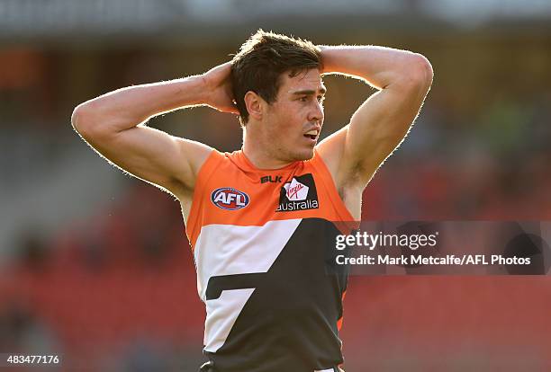 Jeremy Cameron of the Giants reacts to missing a kick at goal during the round 19 AFL match between the Greater Western Sydney Giants and the...