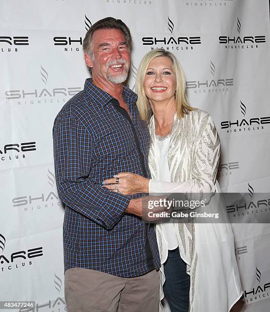 John Easterling poses with his wife, singer/actress Olivia Newton-John, and her daughter, singer Chloe Lattanzi , as they celebrate the 35th...