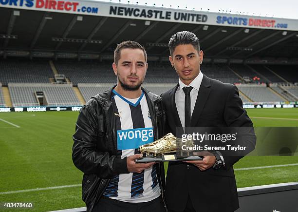 Ayoze Perez of Newcastle is awarded the NUFCTV goal of the season trophy from Shaun Pearce prior to kick off in the Barclays Premier League match...
