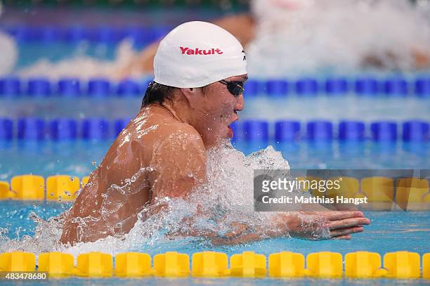 Takuro Fujii of Japan competes in the Men's 4x100m Medley Relay on day sixteen of the 16th FINA World Championships at the Kazan Arena on August 9,...