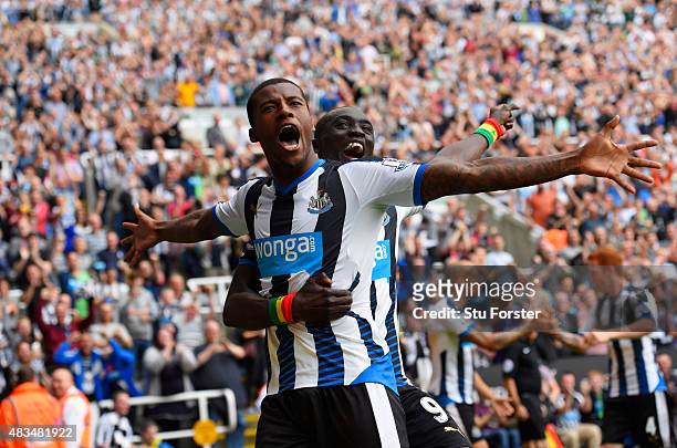 Georginio Wijnaldum of Newcastle United celebrates scoring their second goal with Papiss Demba Cisse of Newcastle United during the Barclays Premier...