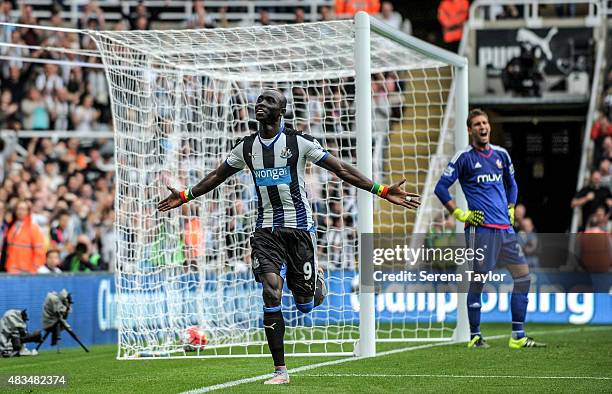 Papiss Cisse of Newcastle celebrates after scoring Newcastles first and equalising goal during the Barclays Premier League match between Newcastle...