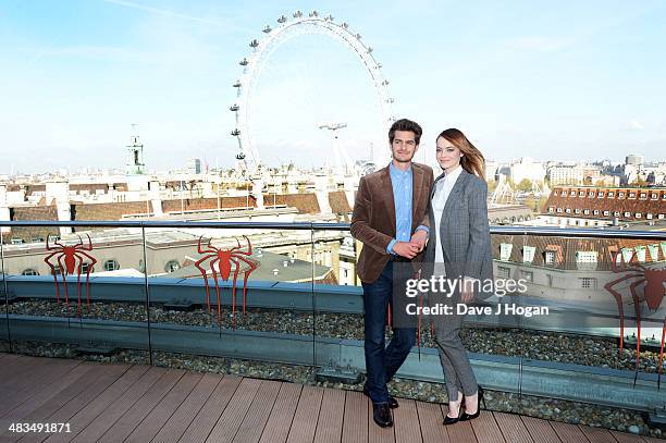 Andrew Garfield and Emma Stone pose at a photocall for 'The Amazing Spider-Man 2' at The Park Plaza Westminster Bridge Hotel on April 9, 2014 in...