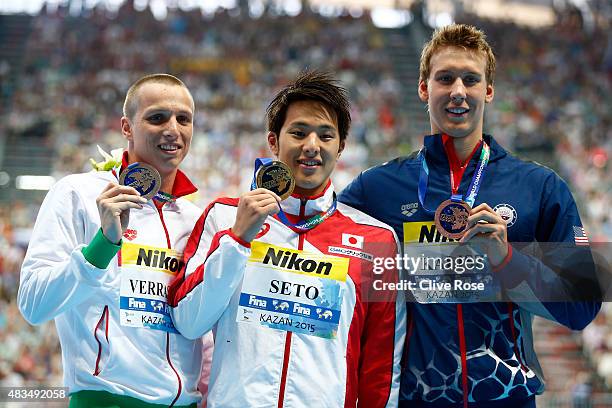 Gold medallist Daiya Seto of Japan poses with silver medallist David Verraszto of Hungary and bronze medallist Chase Kalisz of the United States...