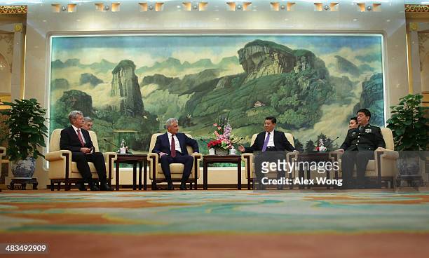 Secretary of Defense Chuck Hagel meets with Chinese President Xi Jinping as U.S. Ambassador to China Max Baucus and Chinese Minister of Defense Chang...