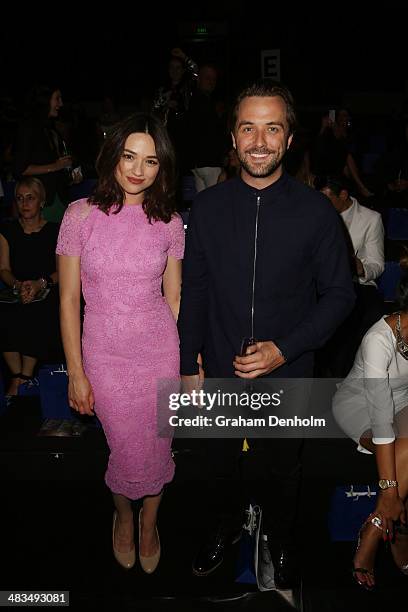 Crystal Reed and Darren McMullen attend the Swarovski show during Mercedes-Benz Fashion Week Australia 2014 at Carriageworks on April 9, 2014 in...