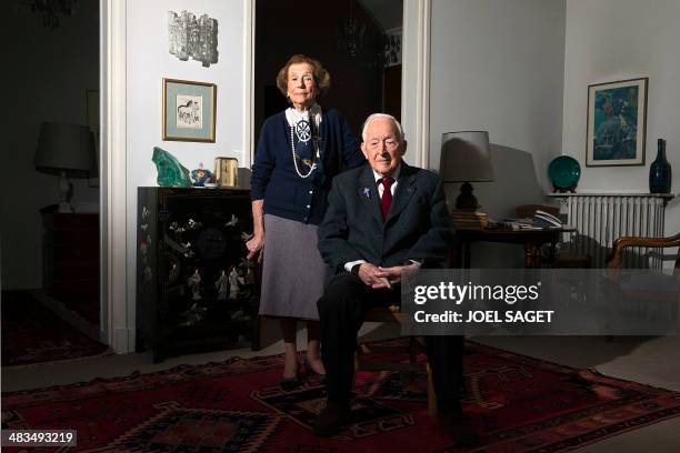 Portait taken on April 8, 2014 in Paris shows Hubert Faure, a former member of the Kieffer commandos, posing with his wife Marie-Louise. The Kieffer...