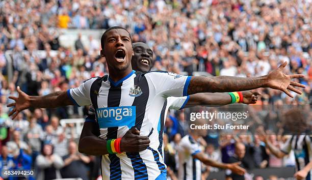 Georginio Wijnaldum of Newcastle United celebrates scoring their second goal with Papiss Demba Cisse of Newcastle United during the Barclays Premier...