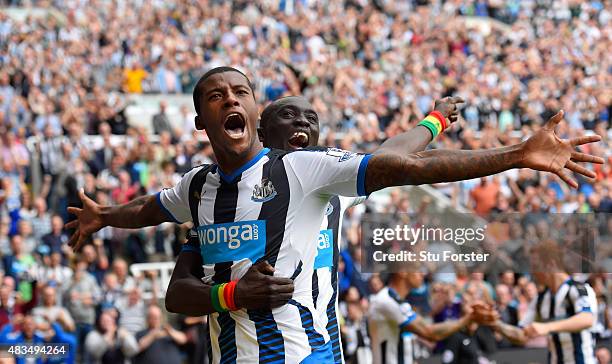 Georginio Wijnaldum of Newcastle United celebrates scoring their second goal with Papiss Demba Cisse of Newcastle United during the Barclays Premier...