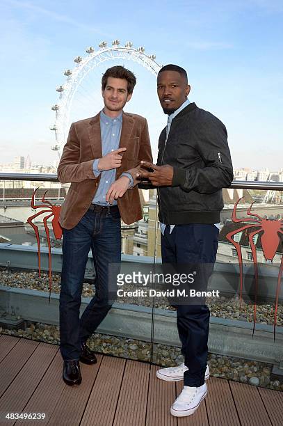 Actors Andrew Garfield and Jamie Foxx attend "The Amazing Spider-Man 2" photocall at Park Plaza Westminster Bridge Hotel on April 9, 2014 in London,...