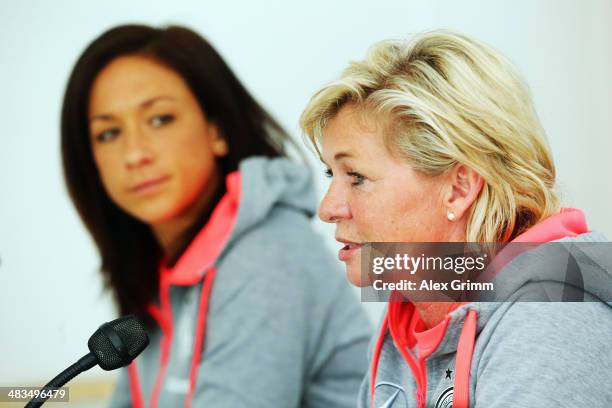 Head coach Silvia Neid and Nadine Kessler attend a Germany press conference at Carl-Benz-Stadion on April 9, 2014 in Mannheim, Germany.