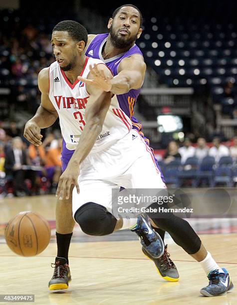 Darius Morris of the Rio Grande Valley Vipers gets fouled by Austin Freeman of the Iowa Energy on April 8, 2014 during game one first round of the...